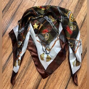 Scarf. Satin. Featuring brown, white, gold and rust